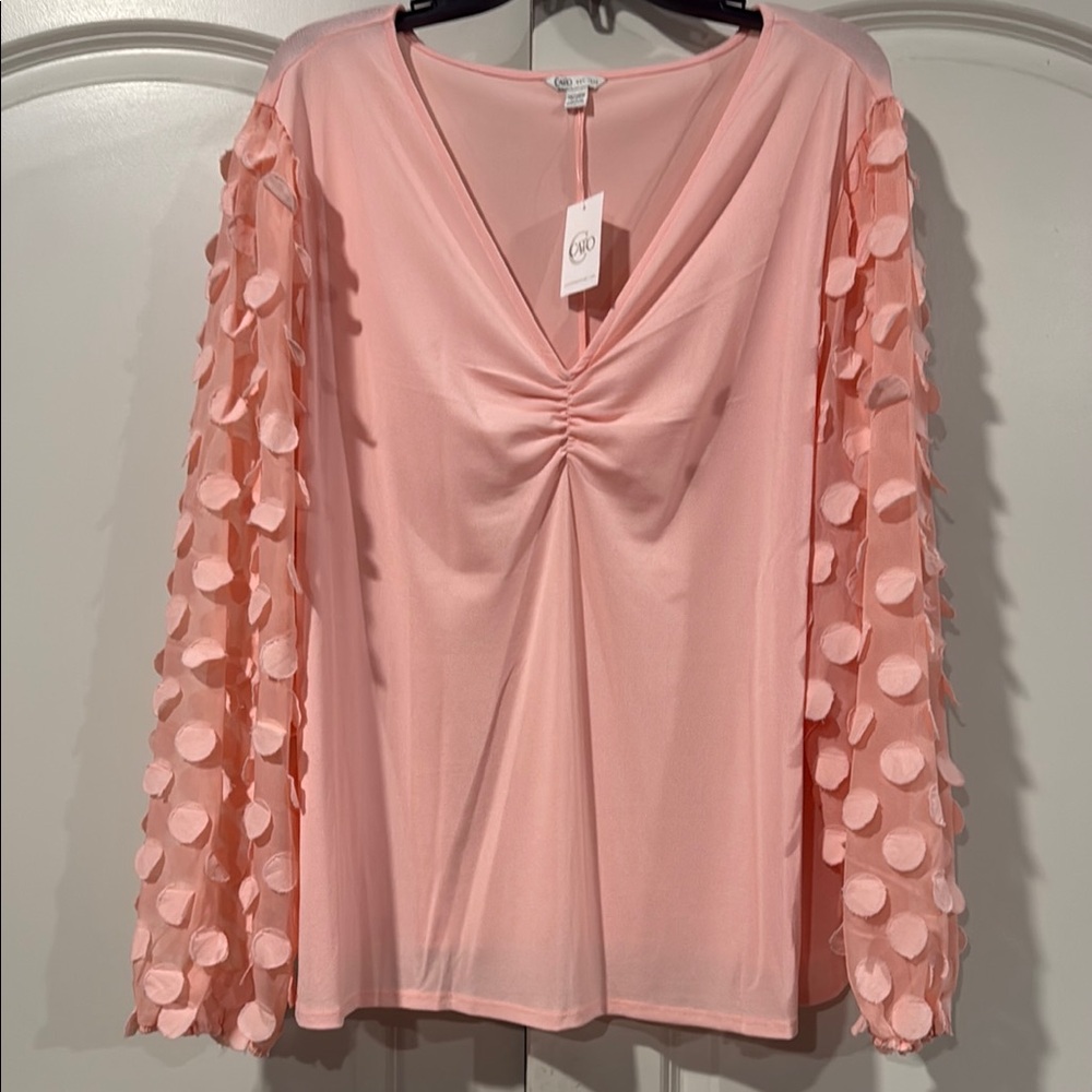 Elegant Pink Women's Top with Textured Sleeves